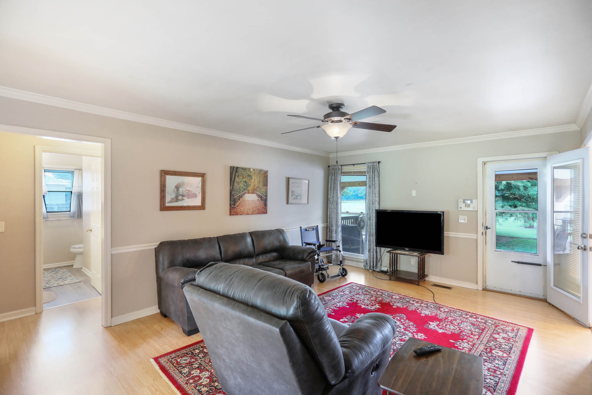4971 Hyde Road Springfield, TN 37172 - Photo 11 of 36 a living room with furniture and a flat screen tv