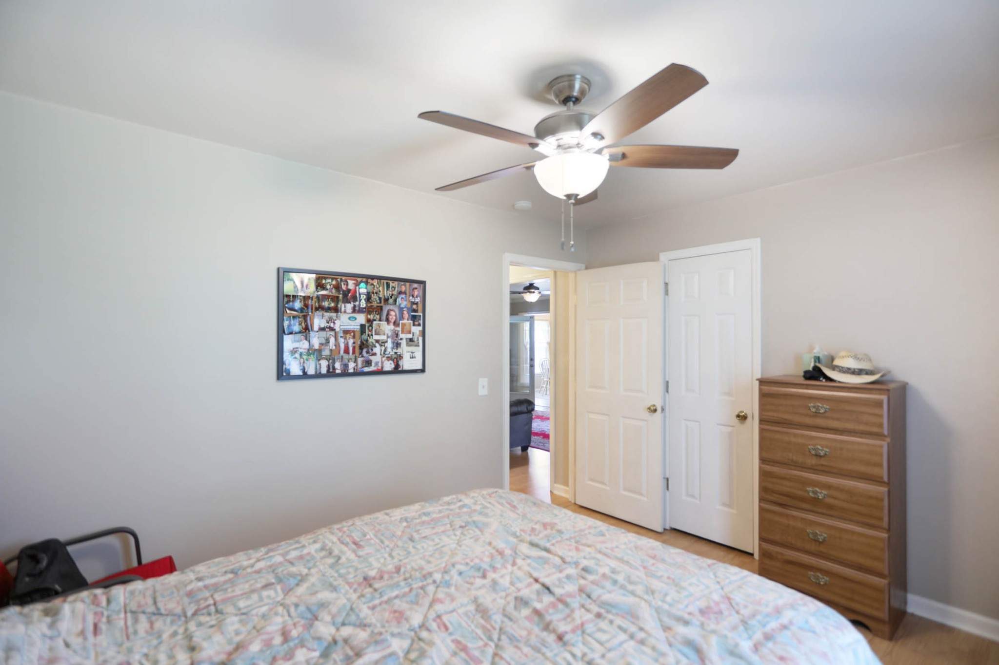 4971 Hyde Road Springfield, TN 37172 - Photo 16 of 36 a bedroom with a bed and a chandelier