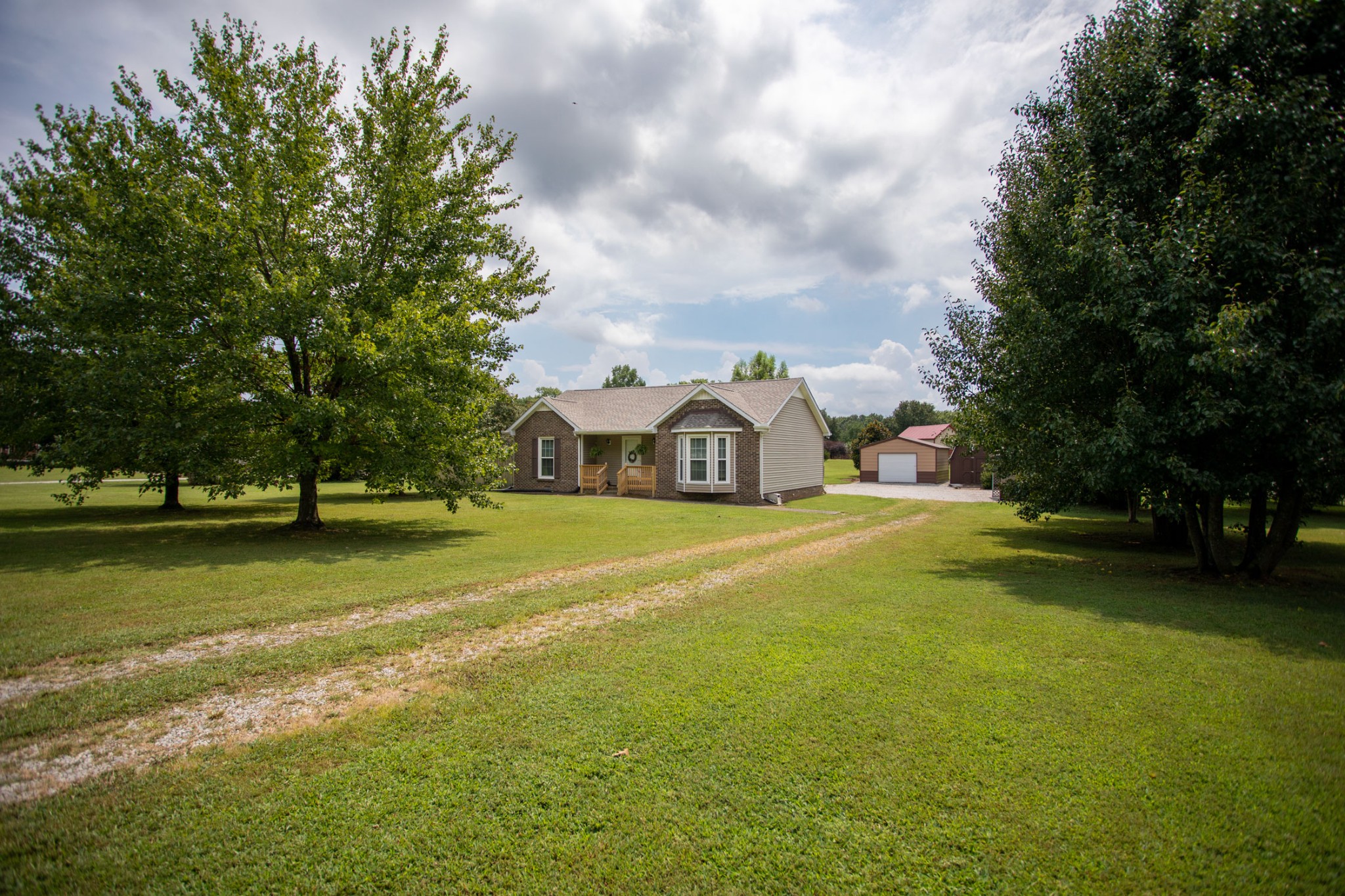 4971 Hyde Road Springfield, TN 37172 - Photo 25 of 36 a front view of a house with a yard and trees