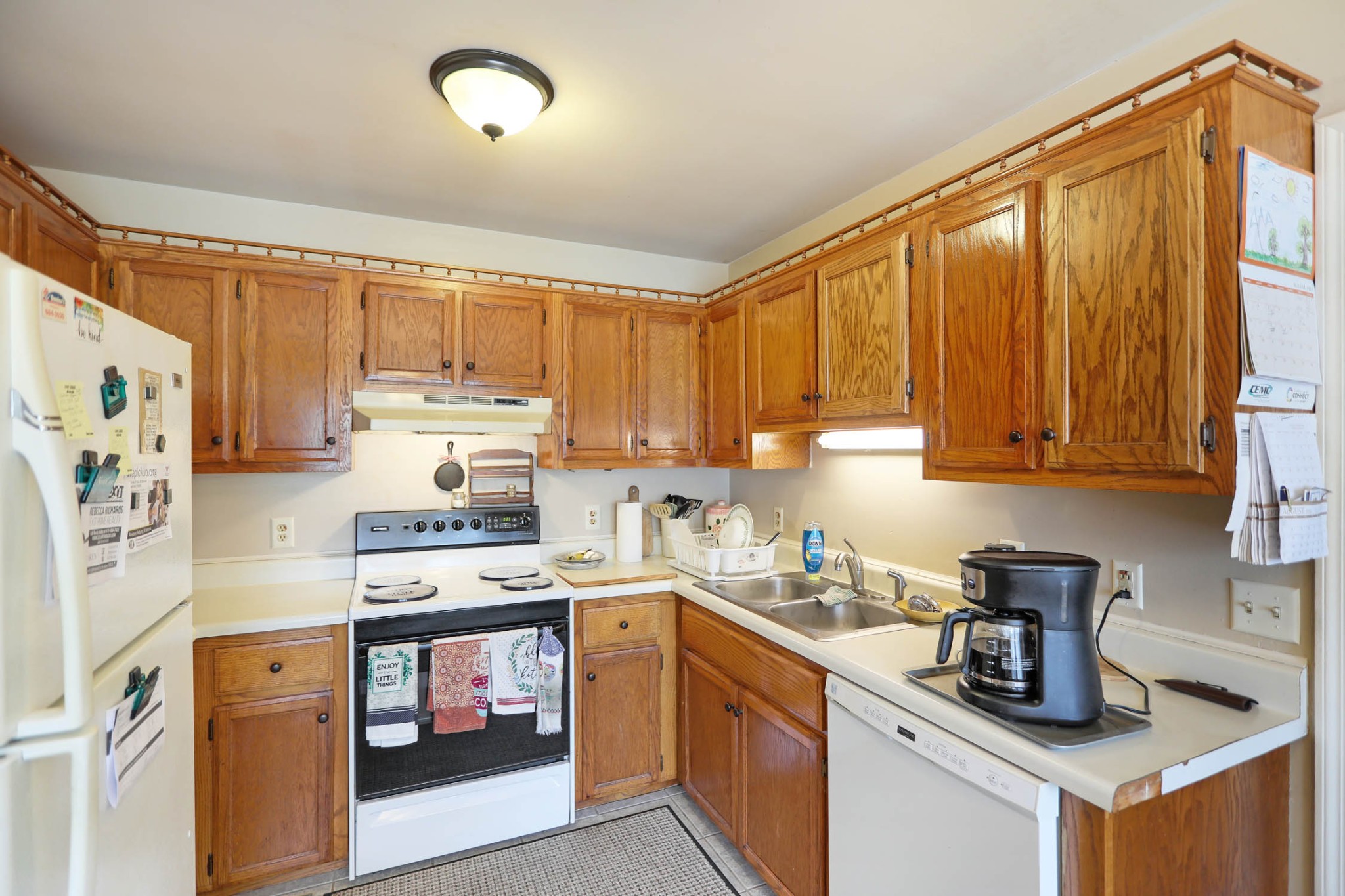 4971 Hyde Road Springfield, TN 37172 - Photo 5 of 36 a kitchen with stainless steel appliances a stove a sink a refrigerator and cabinets
