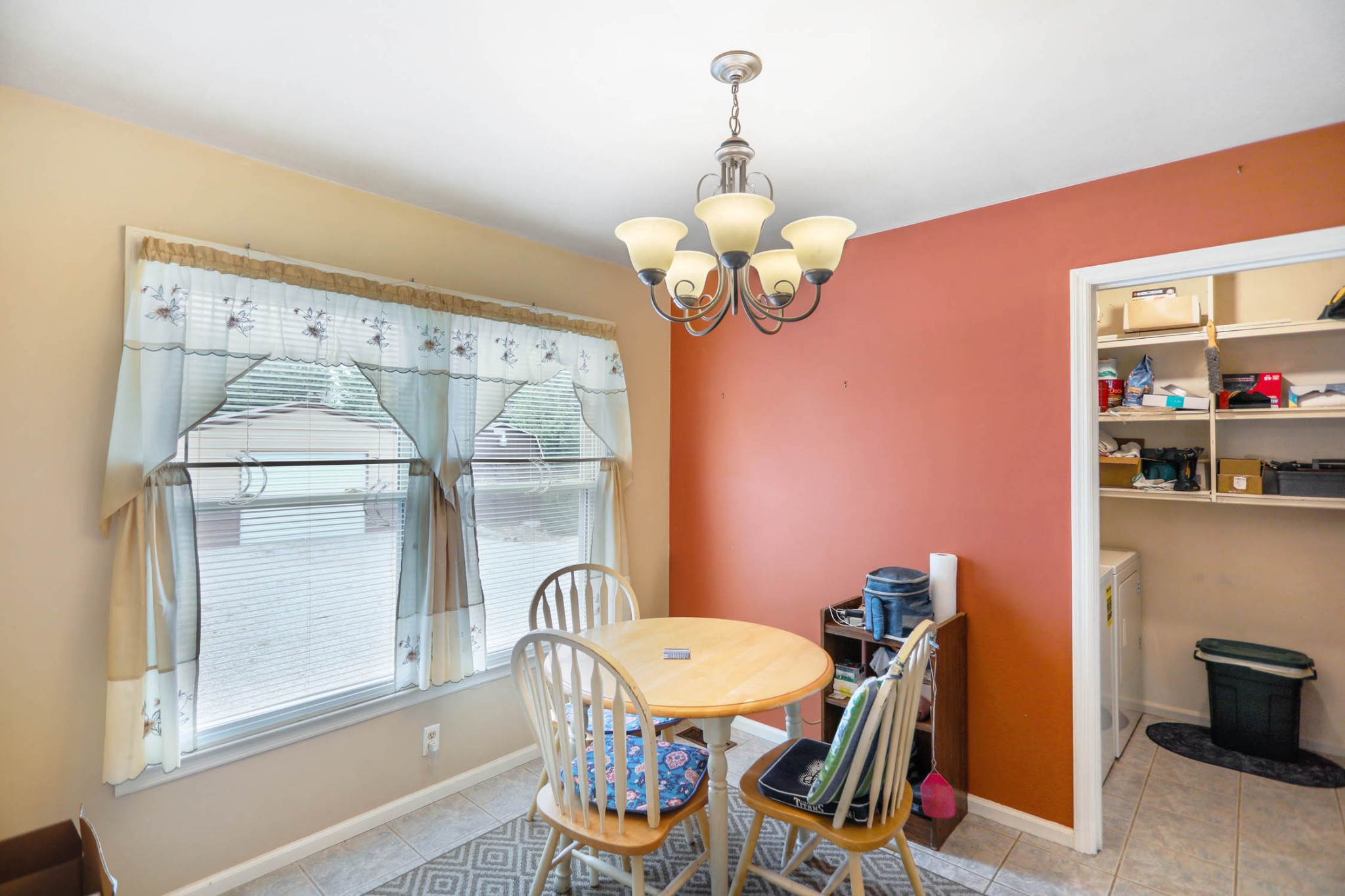 4971 Hyde Road Springfield, TN 37172 - Photo 8 of 36 a view of a dining room with furniture wooden floor and a chandelier
