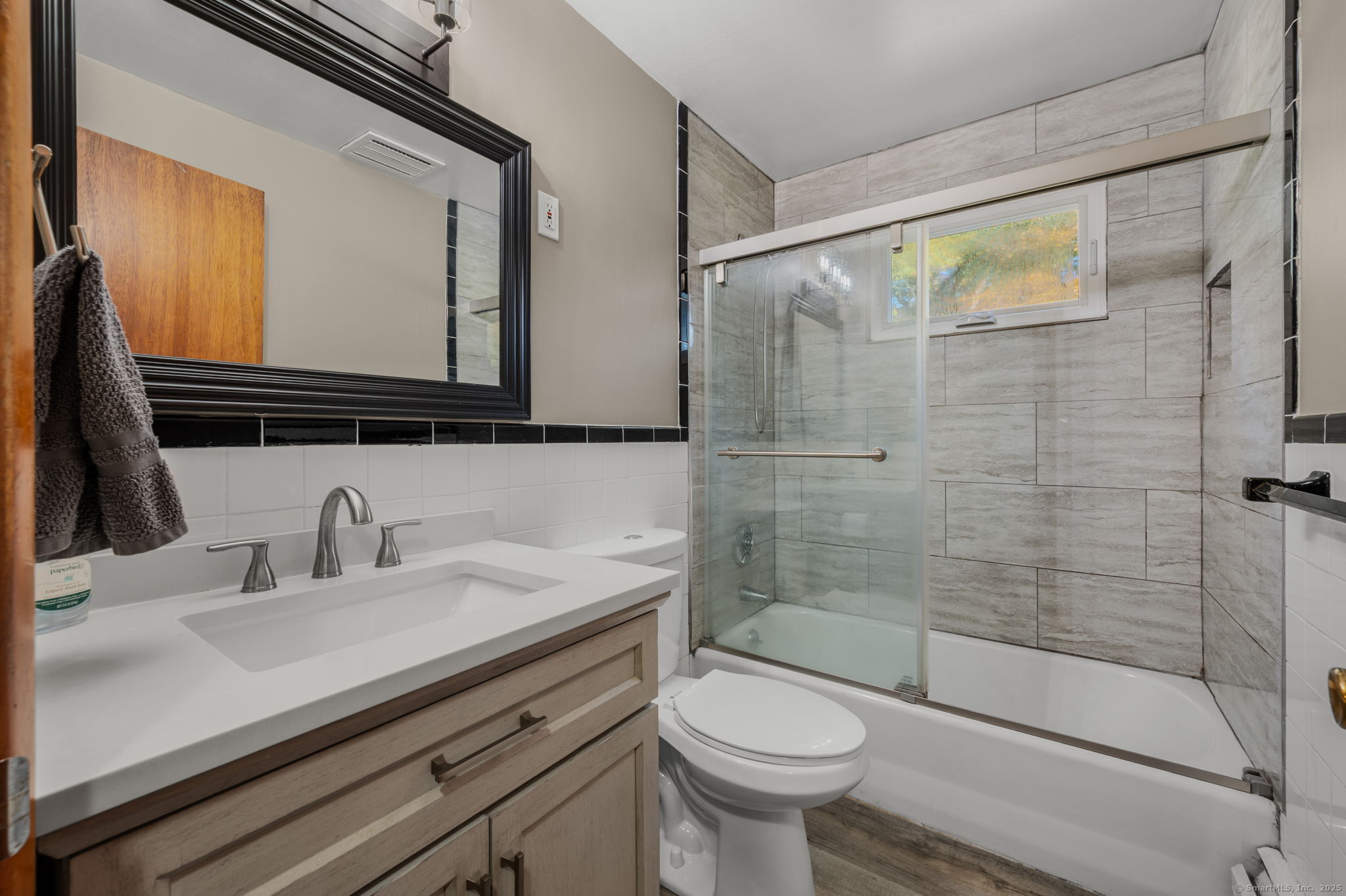 84 Camp Street Middletown, CT 06457 - Photo 14 of 36 a bathroom with a sink a toilet and shower