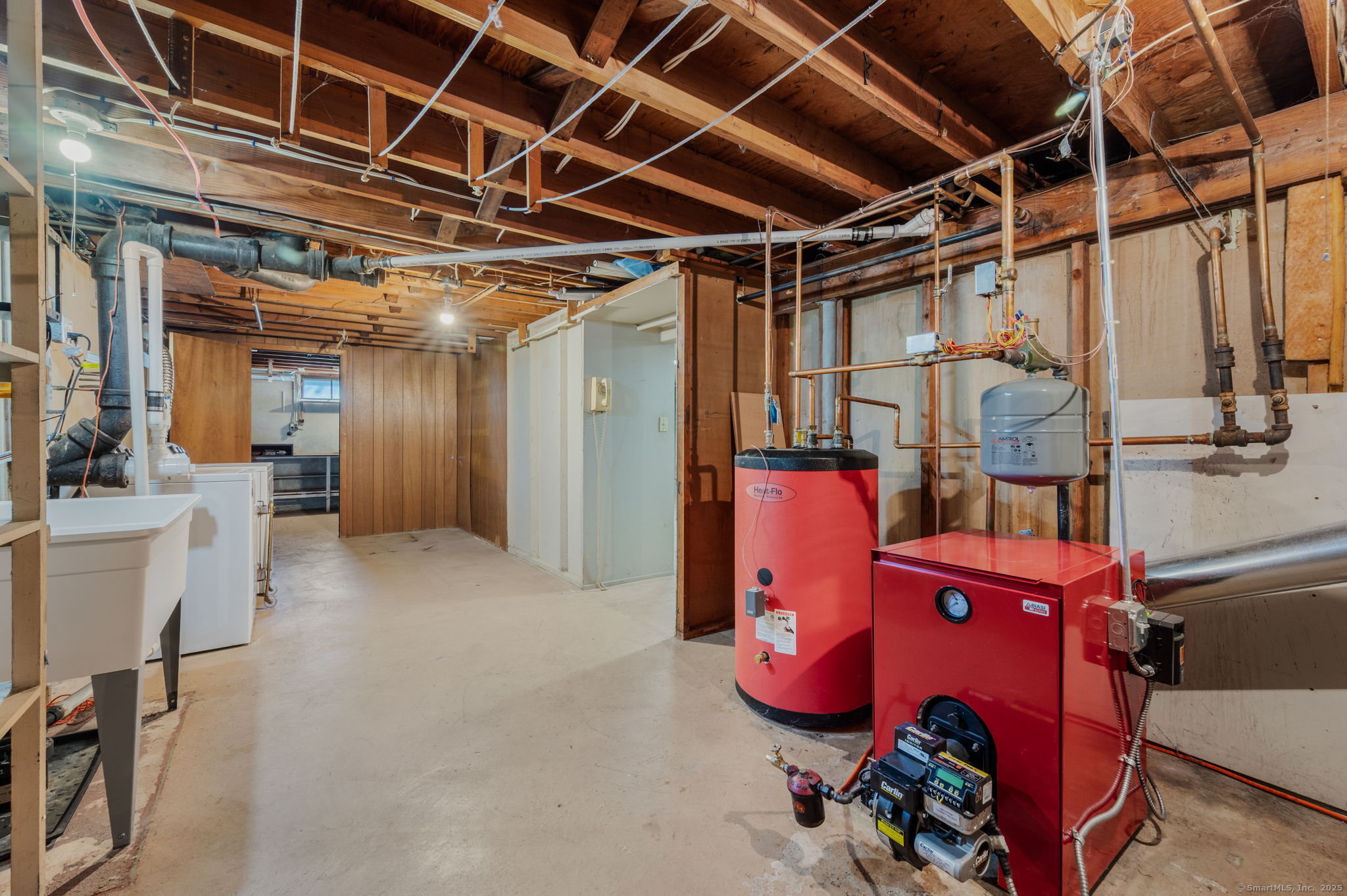 84 Camp Street Middletown, CT 06457 - Photo 21 of 36 a utility room with dryer washer and a view of living room