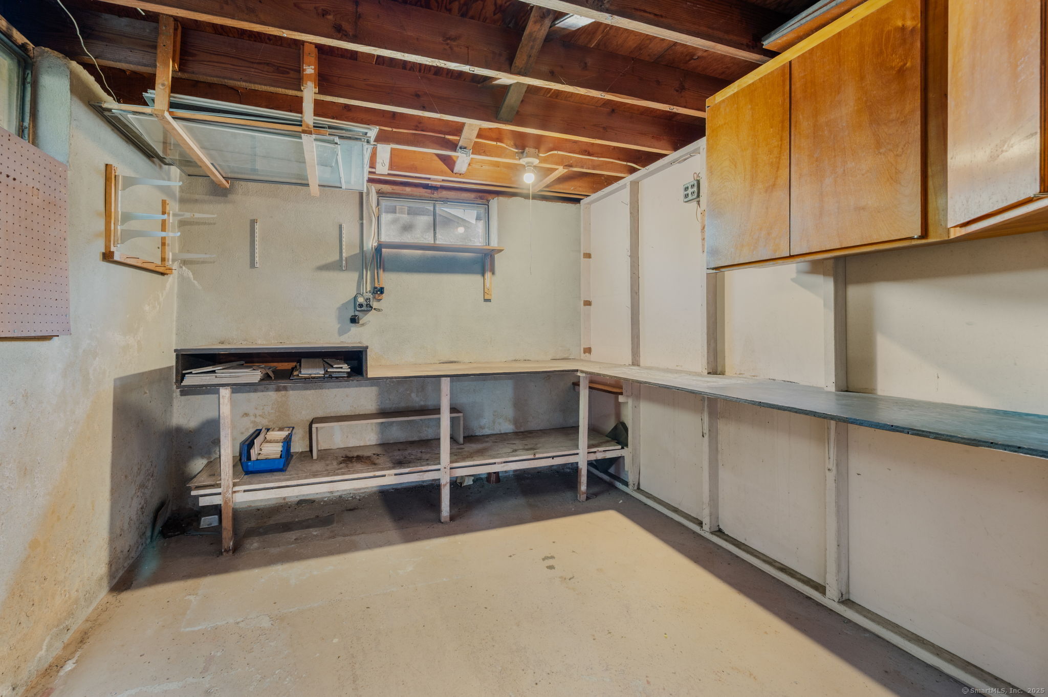 84 Camp Street Middletown, CT 06457 - Photo 23 of 36 a view of storage and utility room with racks on the wall