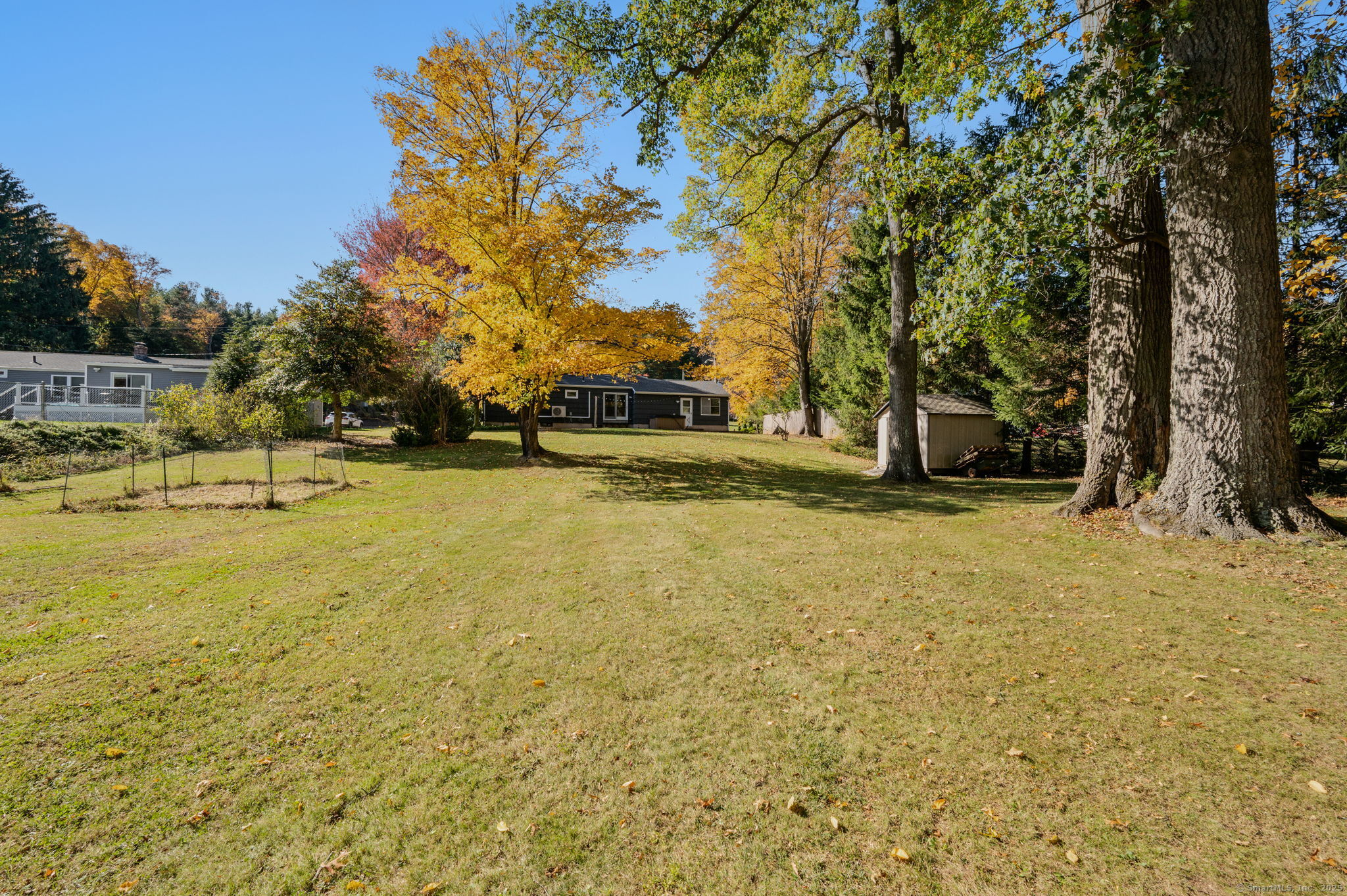 84 Camp Street Middletown, CT 06457 - Photo 27 of 36 a view of yard with swimming pool and trees