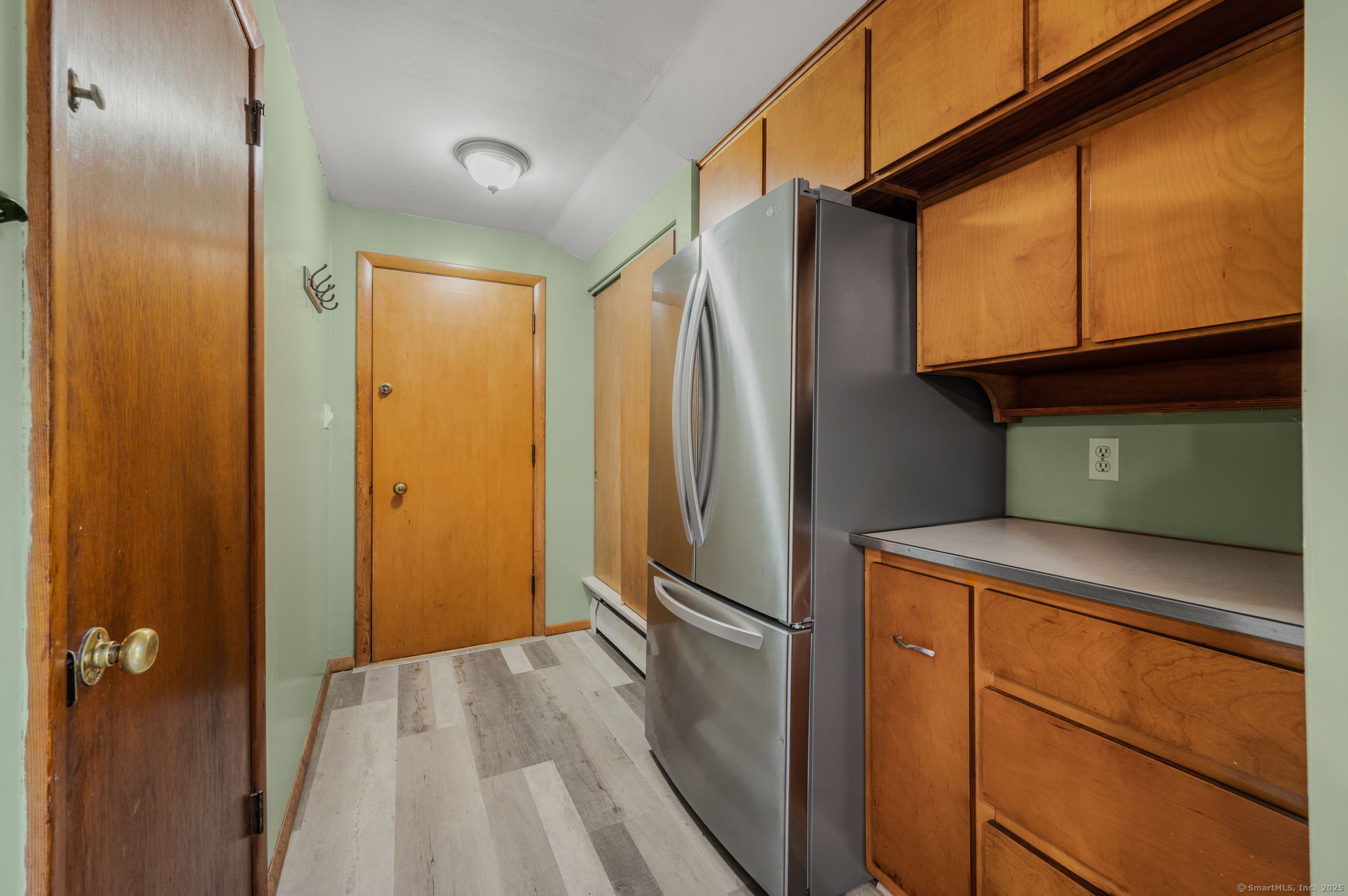 84 Camp Street Middletown, CT 06457 - Photo 9 of 36 a kitchen with a refrigerator and a sink