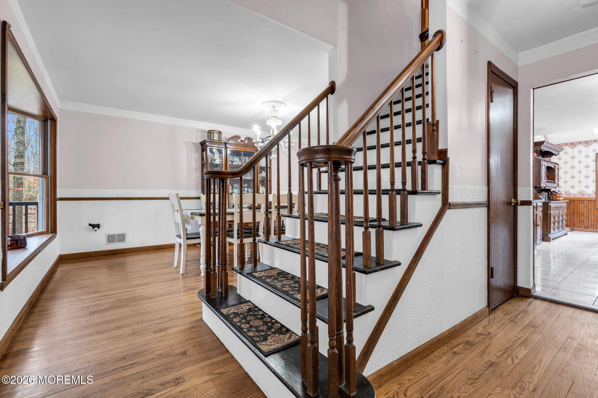 106 Vienna Road Howell, NJ 07731 - Photo 2 of 59 a view of entryway with wooden floor and stairs
