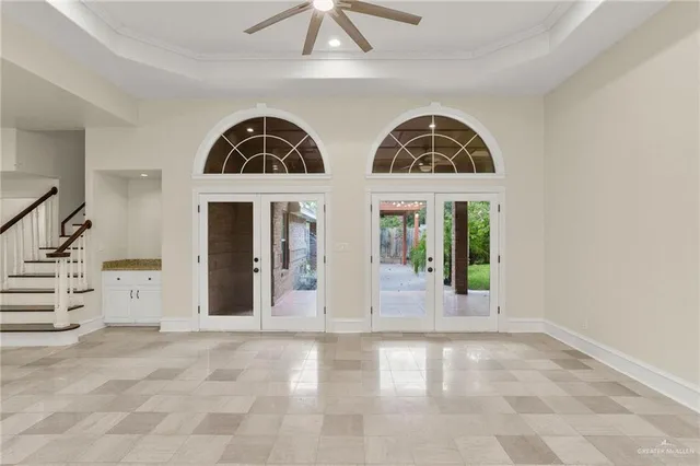 a view of a hallway with windows