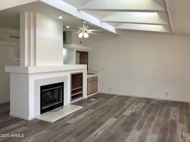 a view of empty room with windows