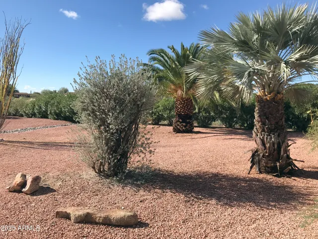 a view of an empty room with a window and balcony