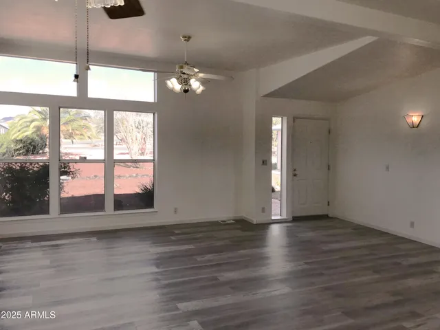 a kitchen with a stove and a refrigerator