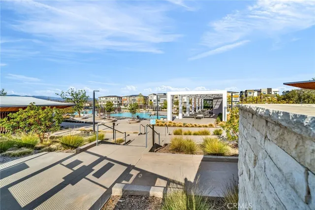 a view of a balcony with lake view and wooden floor