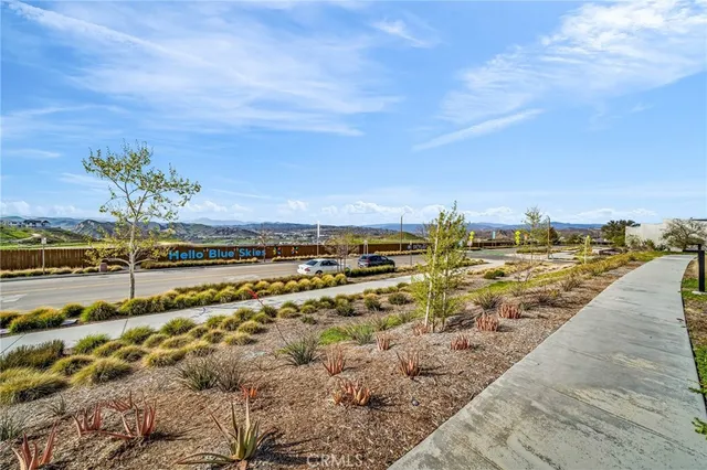 a view of a swimming pool with a lounge chairs