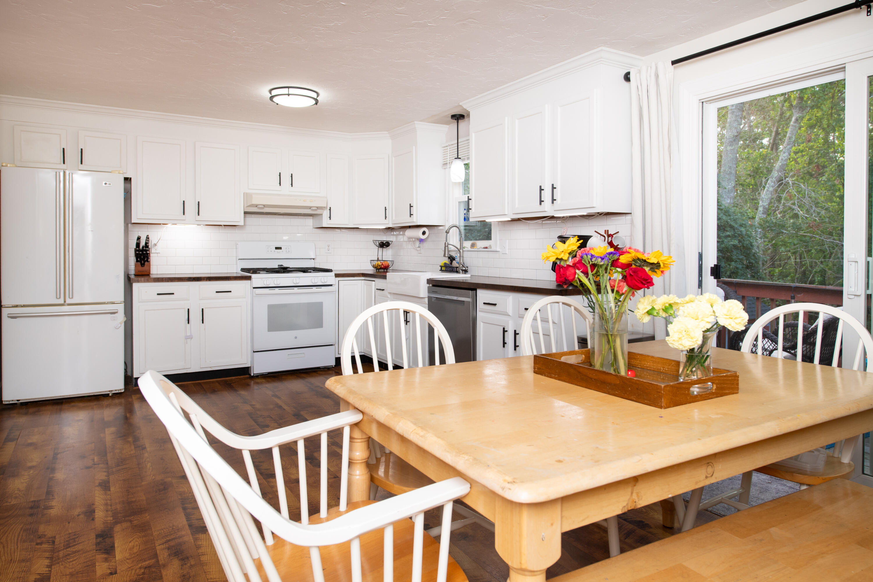 11 Warwick Way Mashpee, MA 02649 - Photo 11 of 67 a kitchen with granite countertop a sink a counter top space stainless steel appliances and cabinets
