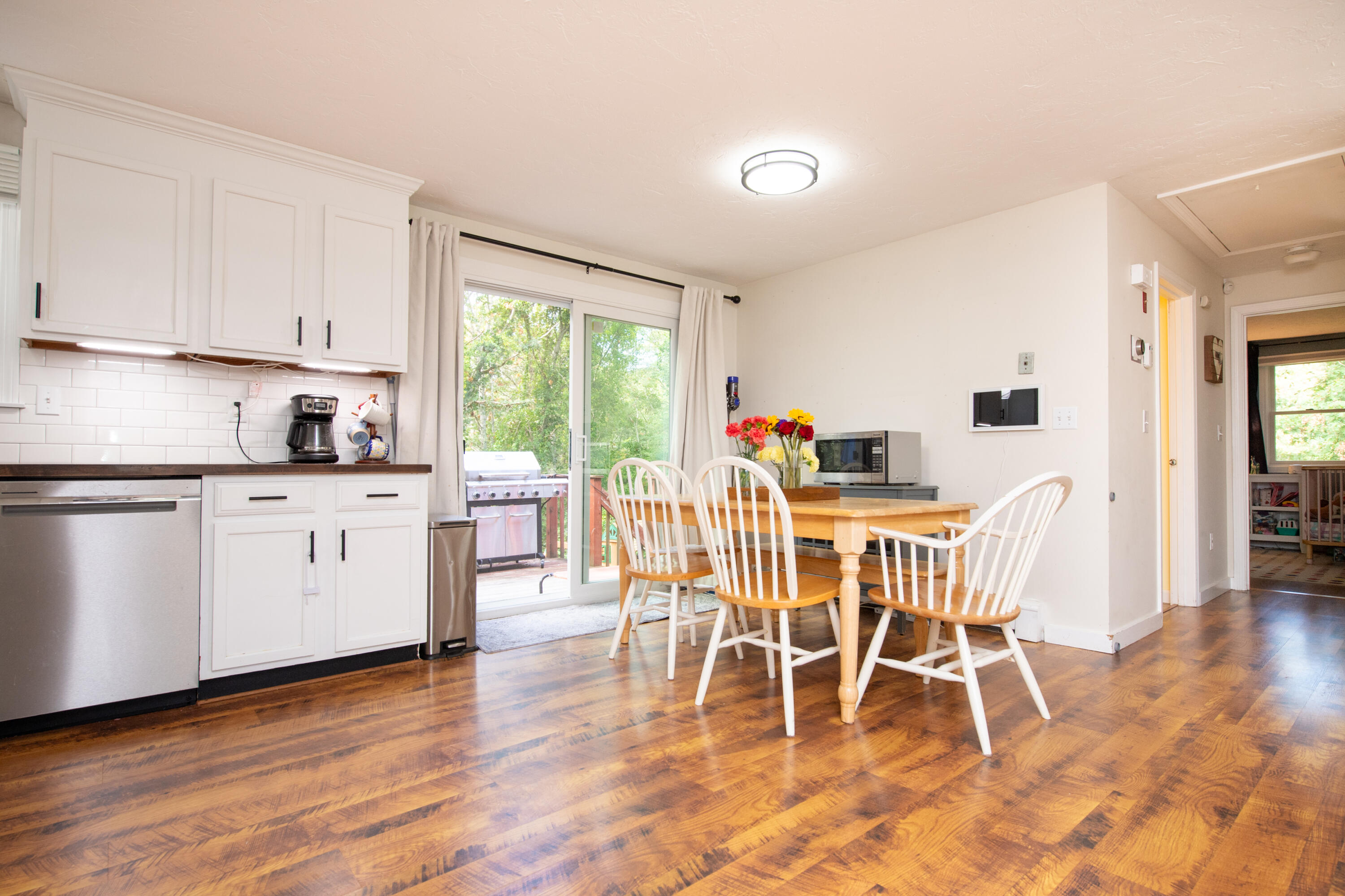 11 Warwick Way Mashpee, MA 02649 - Photo 12 of 67 a dining room with furniture and wooden floor
