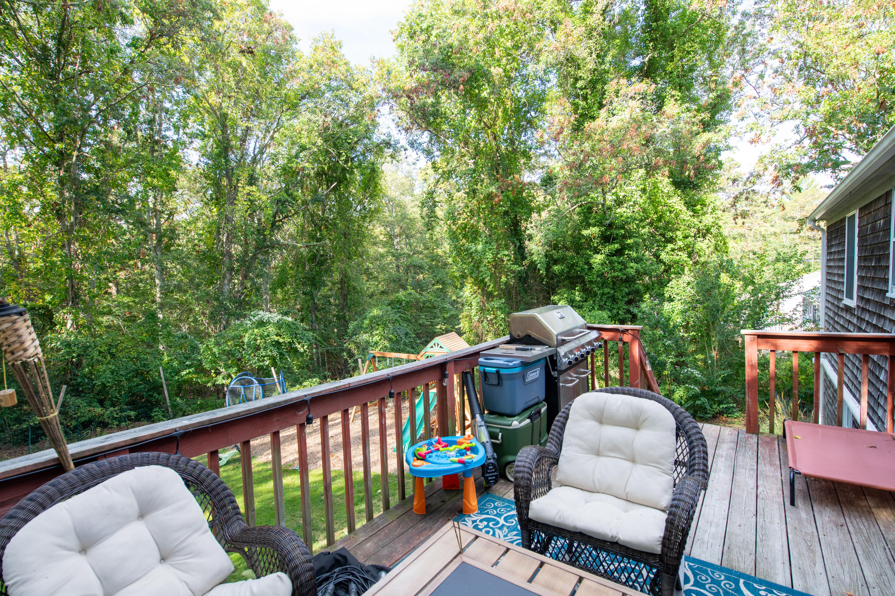 11 Warwick Way Mashpee, MA 02649 - Photo 17 of 67 a balcony with wooden floor stairs and furniture