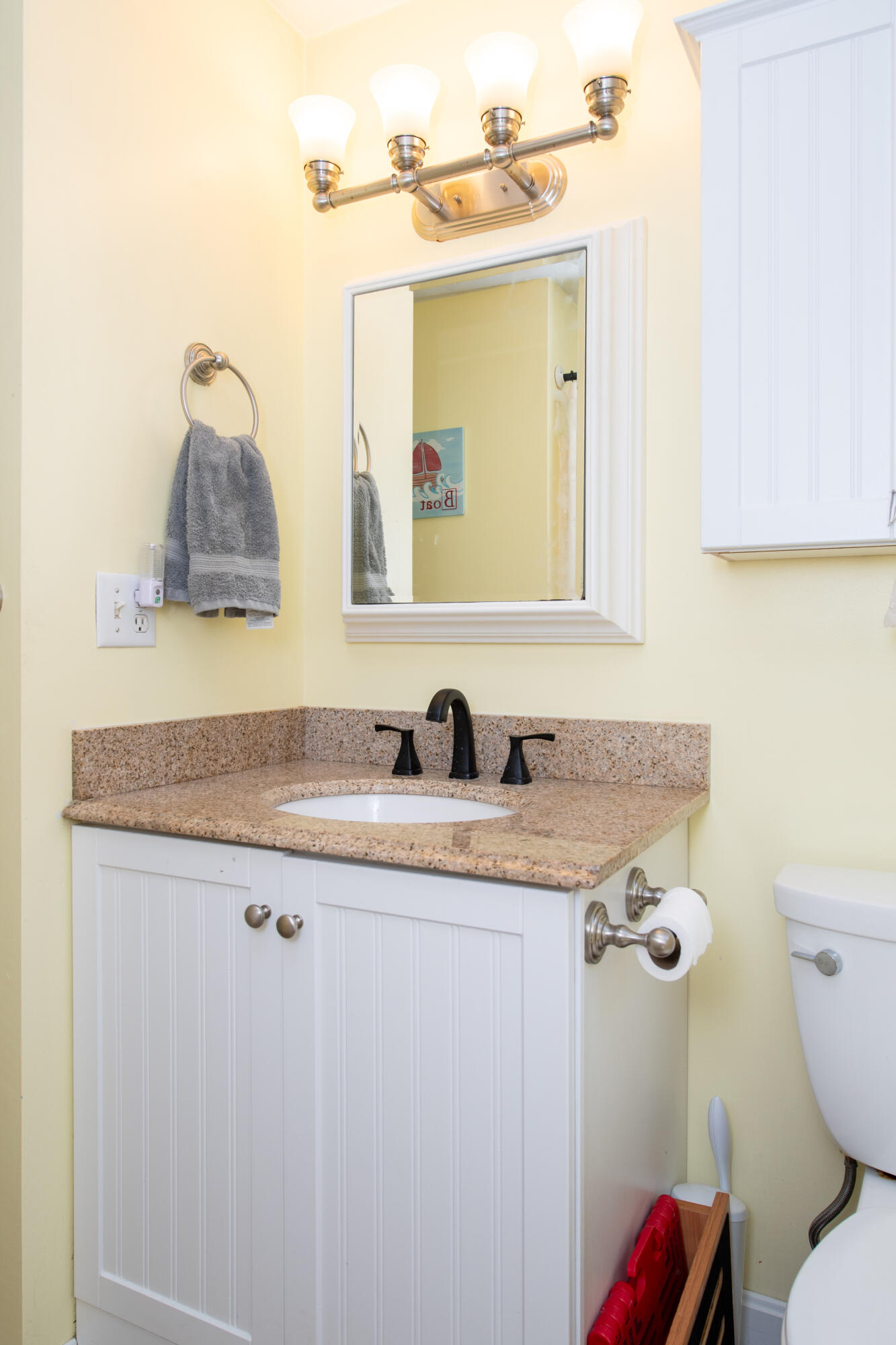 11 Warwick Way Mashpee, MA 02649 - Photo 23 of 67 a bathroom with a granite countertop toilet sink and mirror