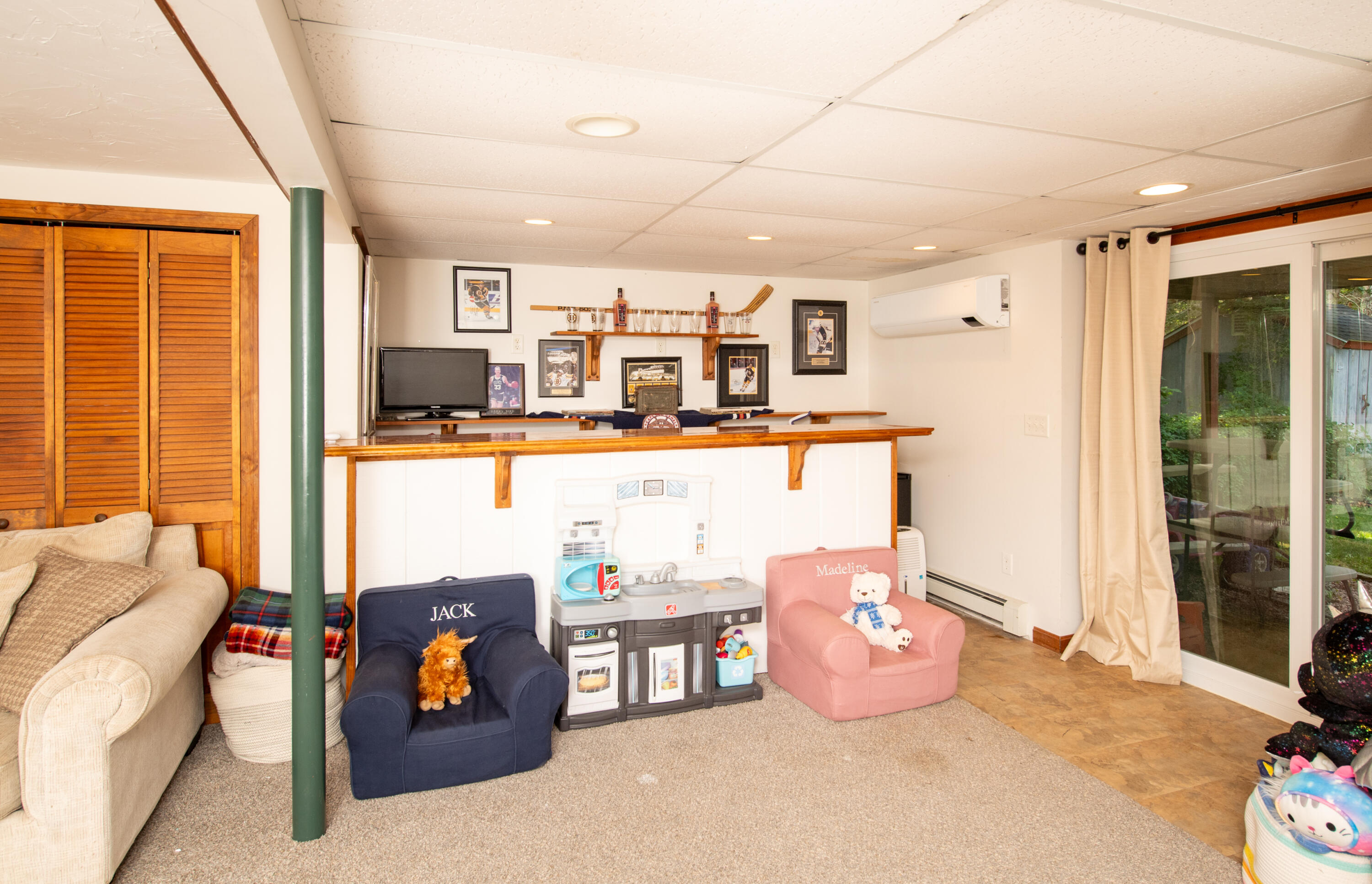 11 Warwick Way Mashpee, MA 02649 - Photo 35 of 67 a living room with furniture and a flat screen tv
