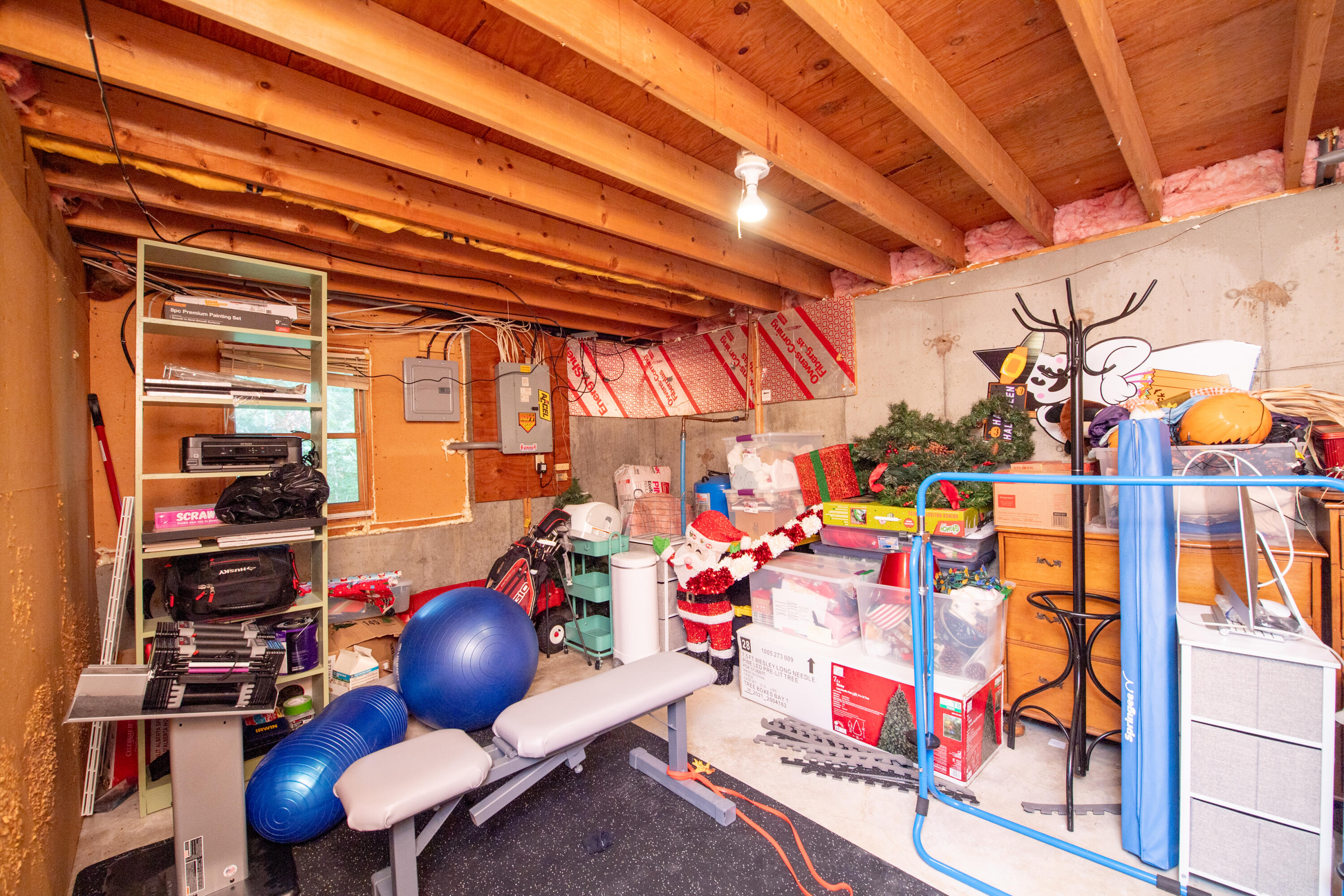 11 Warwick Way Mashpee, MA 02649 - Photo 46 of 67 a room with lots of stuff on wall and a large window