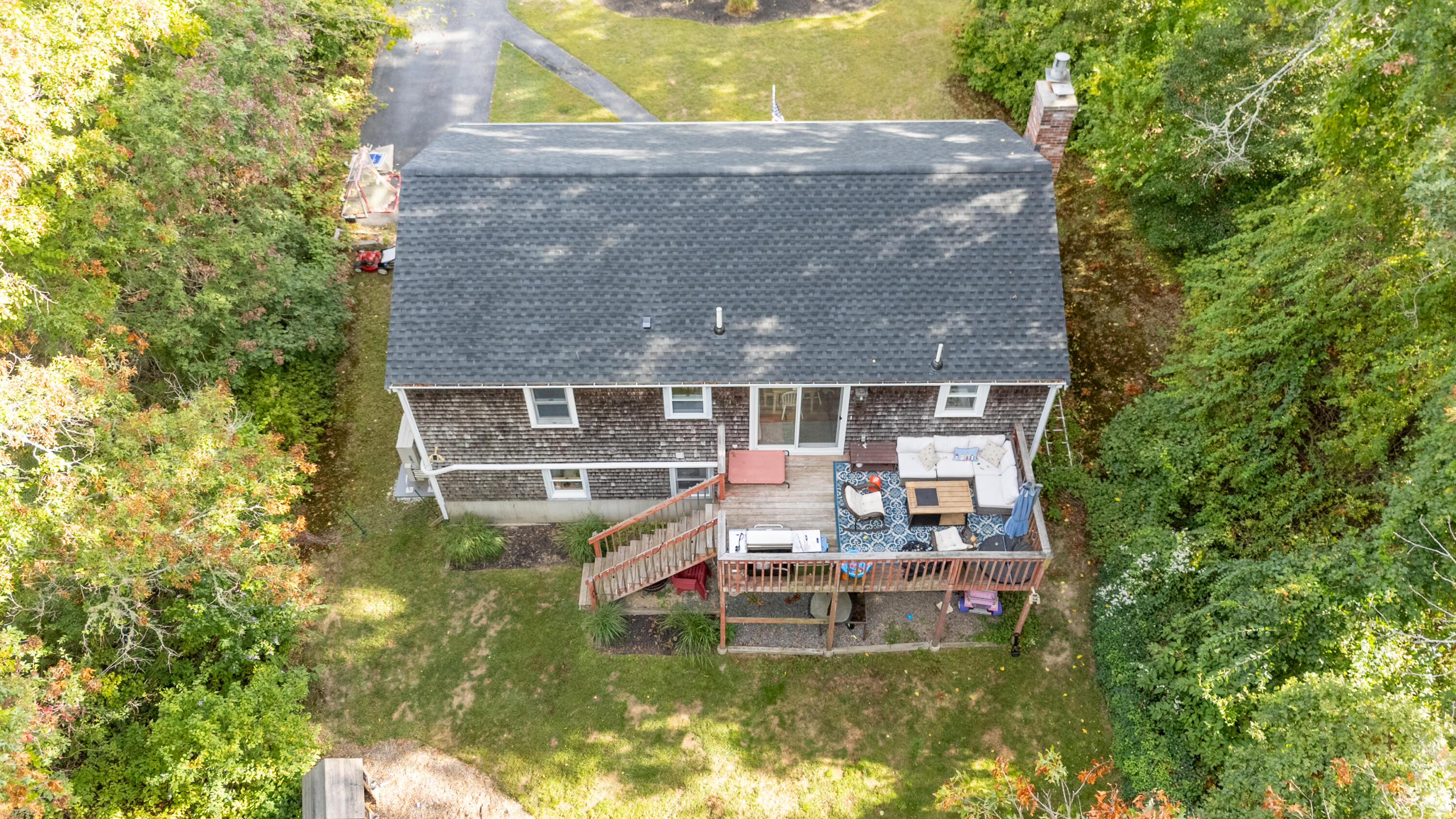 11 Warwick Way Mashpee, MA 02649 - Photo 57 of 67 a view of a house with a yard and sitting area
