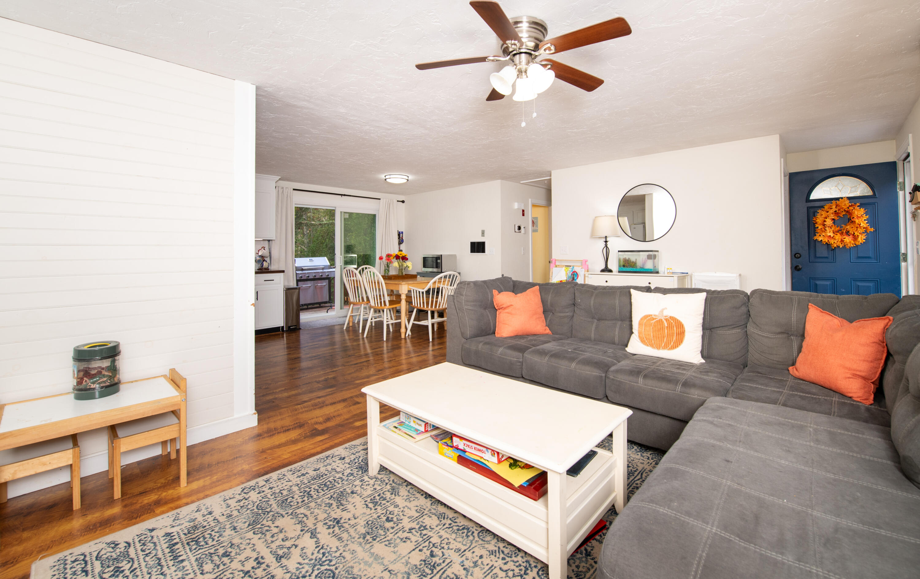 11 Warwick Way Mashpee, MA 02649 - Photo 7 of 67 a living room with furniture and a wooden floor