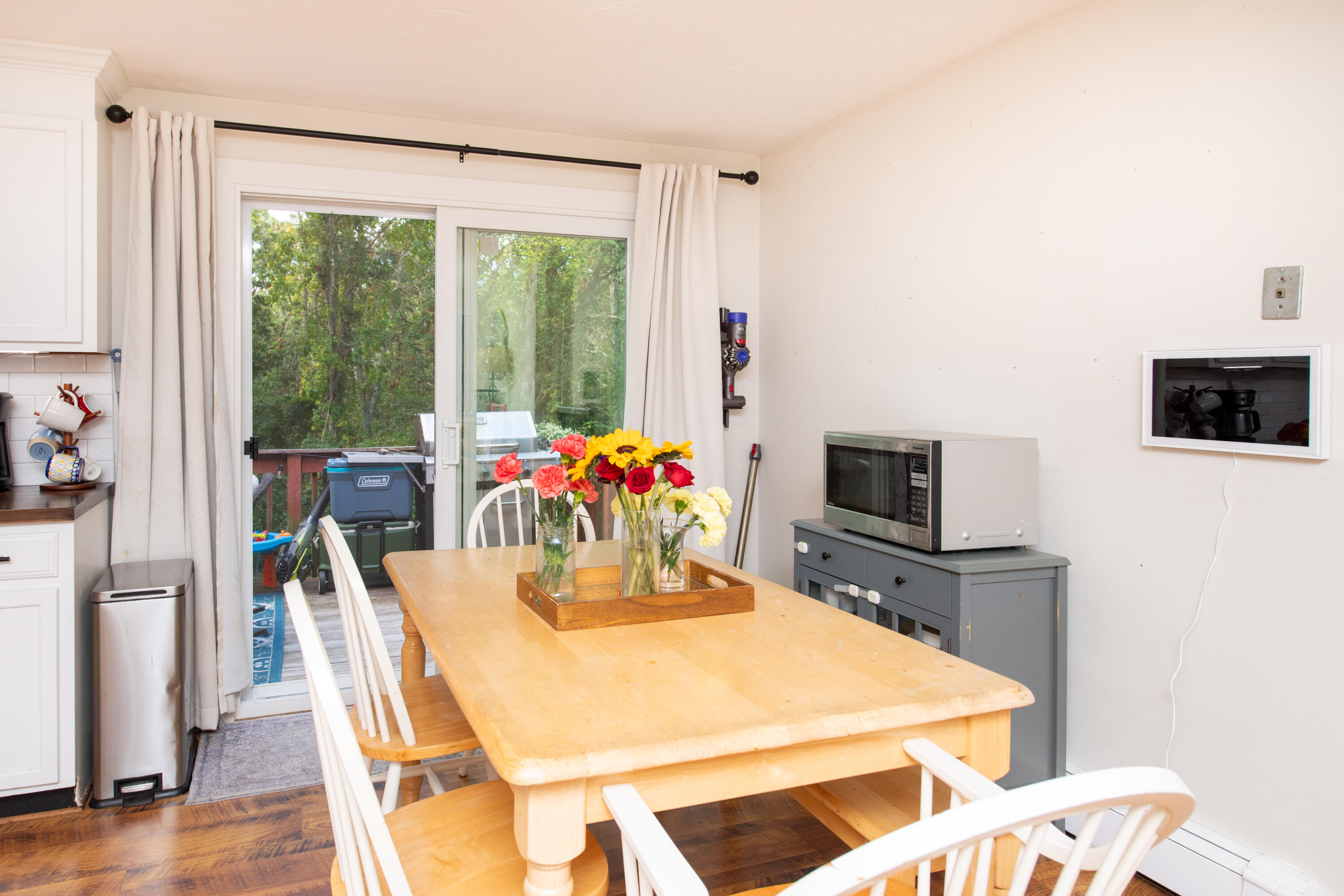 11 Warwick Way Mashpee, MA 02649 - Photo 10 of 67 a view of a dining room with furniture window and wooden floor