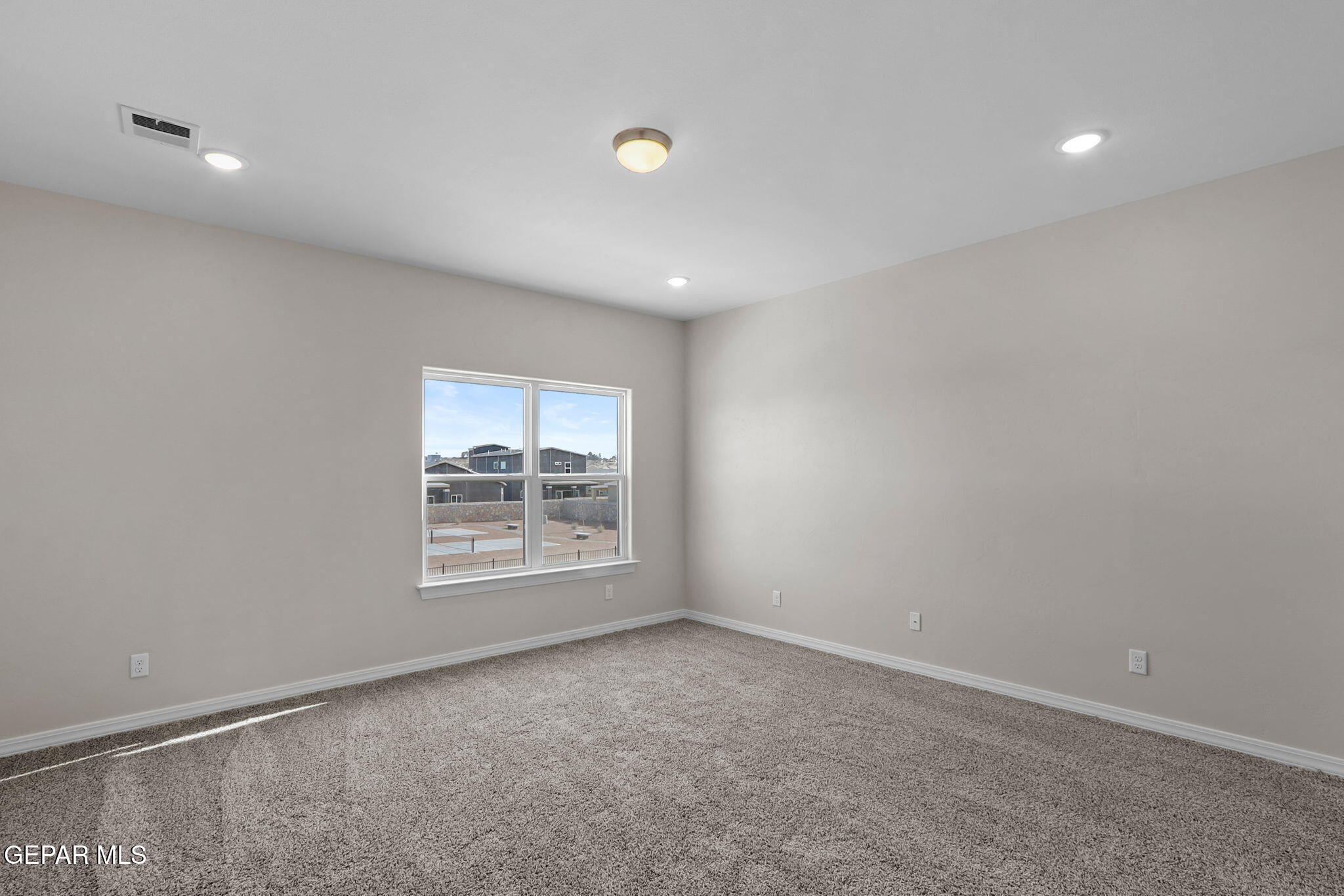 15213 Conviction Avenue El Paso, TX 79938 - Photo 27 of 41 an empty room with a window