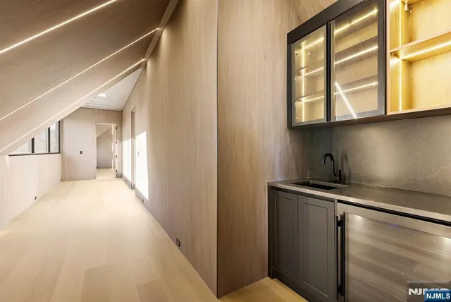 a view of a kitchen from the hallway