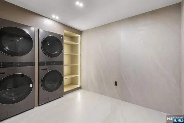 a view of a storage & utility room with washer and dryer