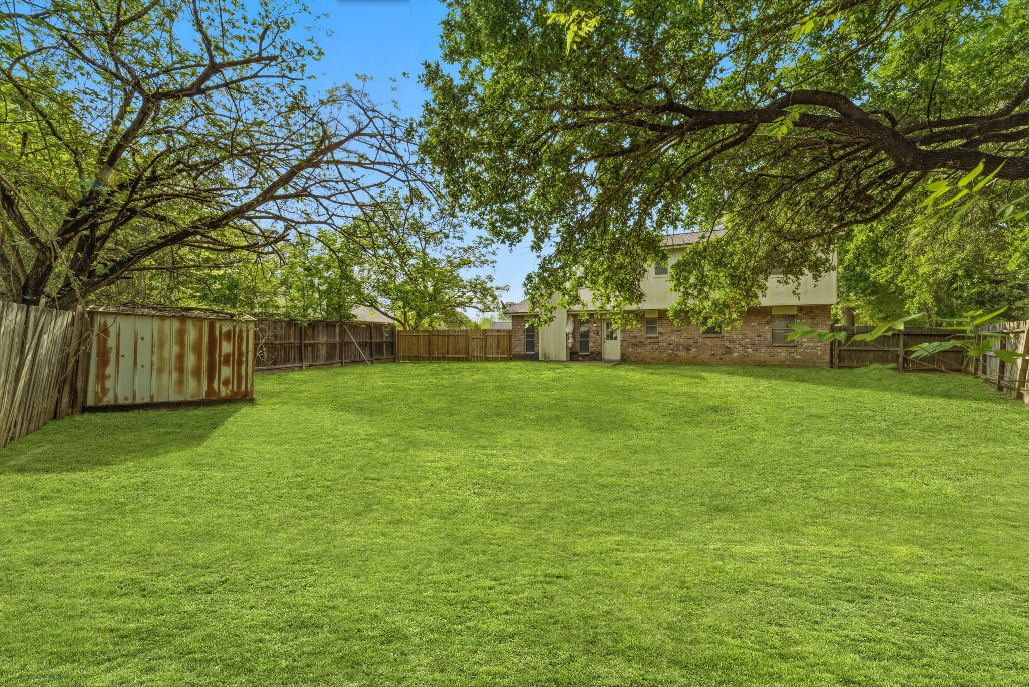 6914 Ten Curves Road Spring, TX 77379 - Photo 23 of 26 Equipped with metal storage shed.
