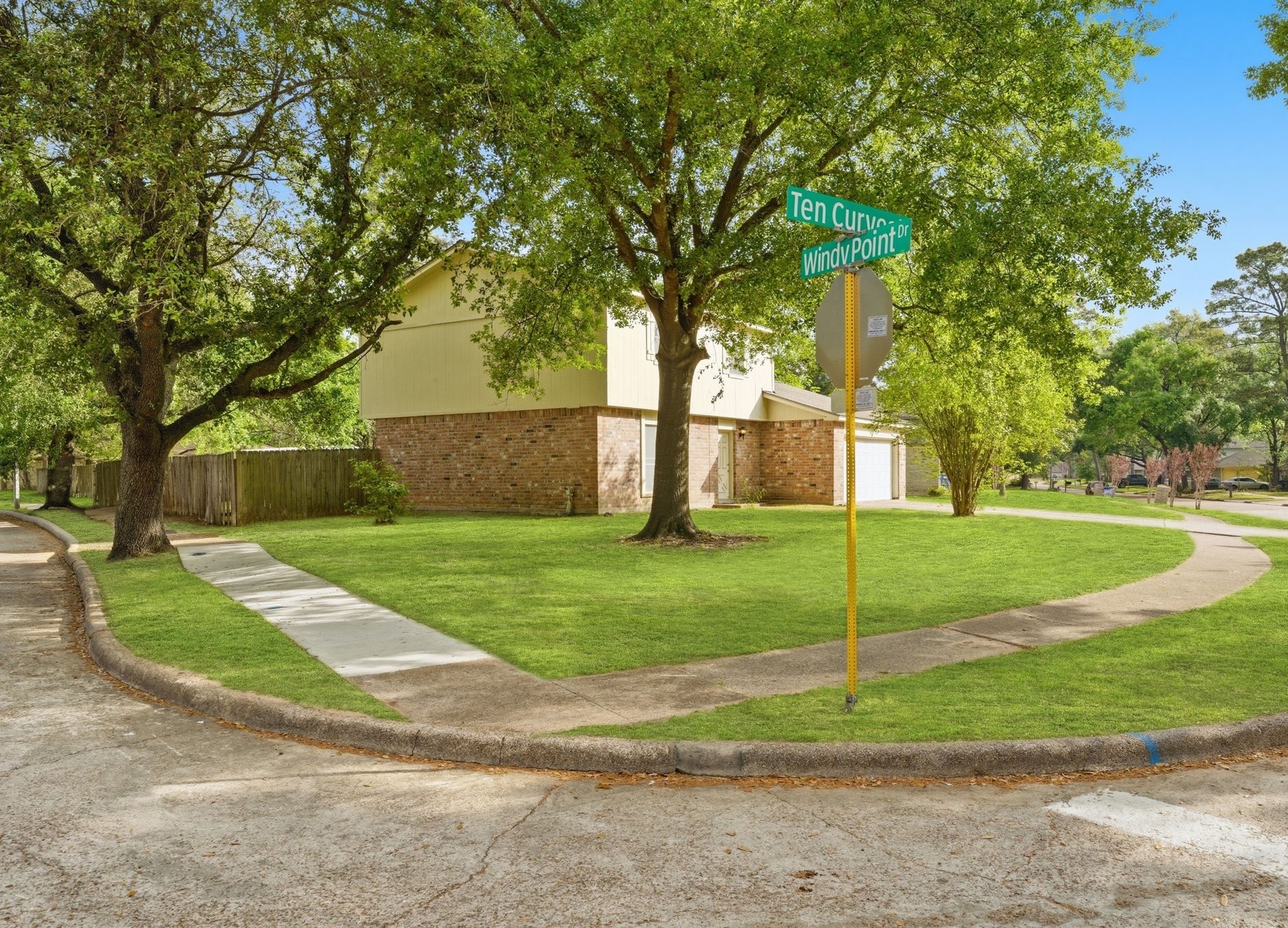 6914 Ten Curves Road Spring, TX 77379 - Photo 3 of 26 Situated on a corner lot allowing for ample front and backyard space.