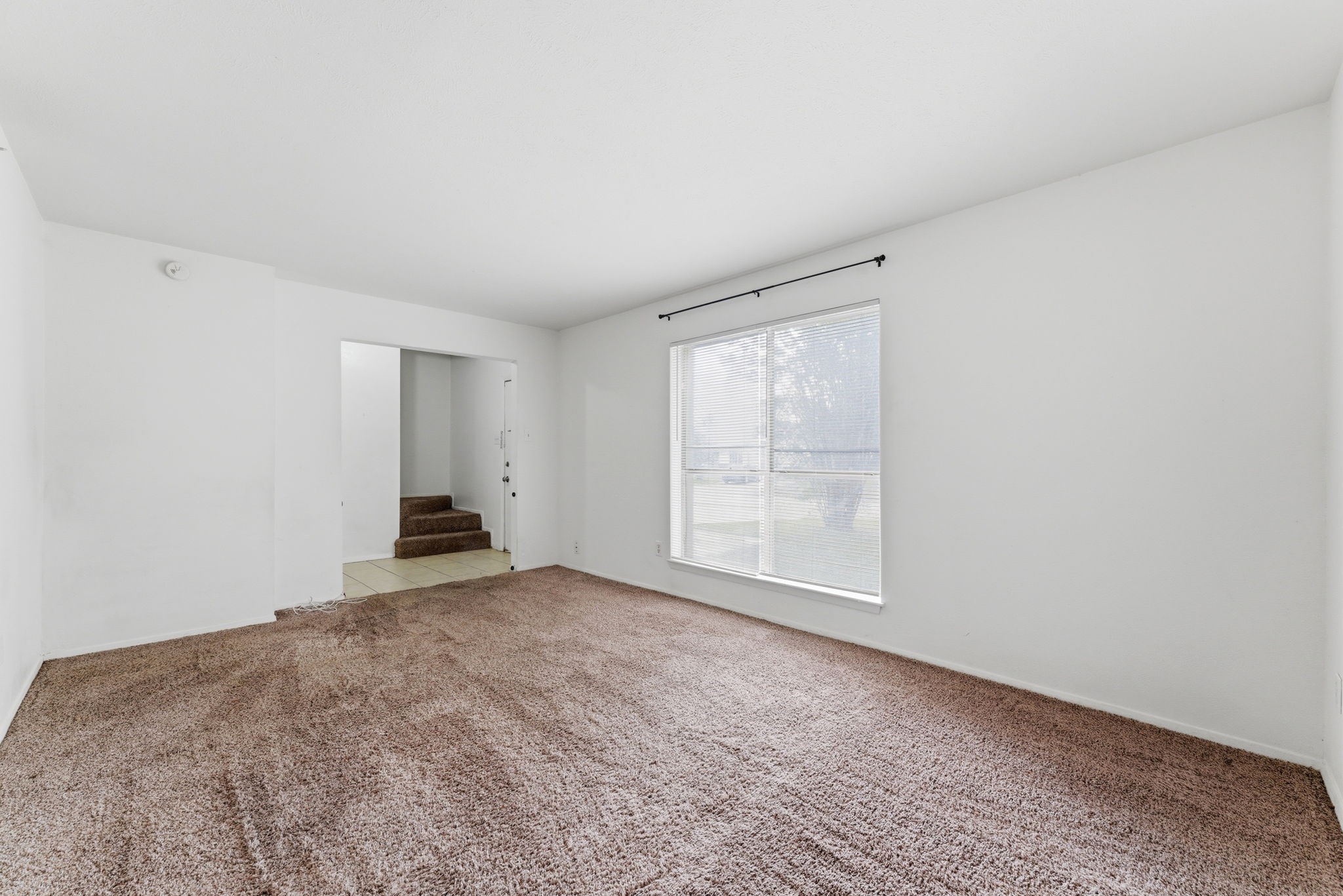 6914 Ten Curves Road Spring, TX 77379 - Photo 6 of 26 The den features front yard views.