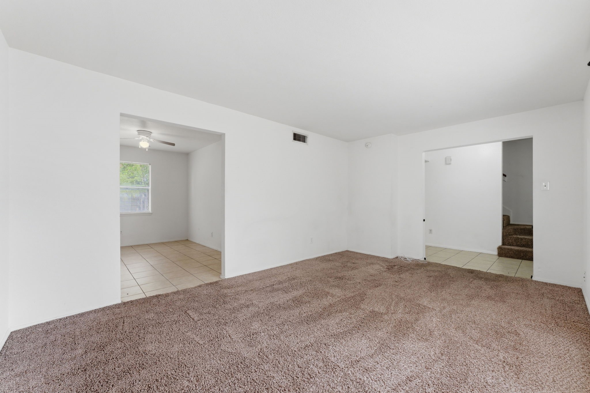 6914 Ten Curves Road Spring, TX 77379 - Photo 7 of 26 Access to breakfast room and kitchen from the den.