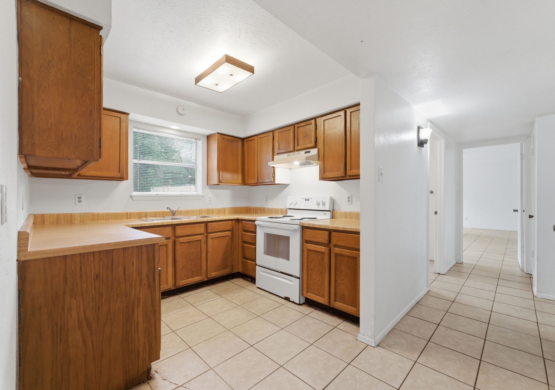 6914 Ten Curves Road Spring, TX 77379 - Photo 10 of 26 Family room is located down the hall from kitchen.