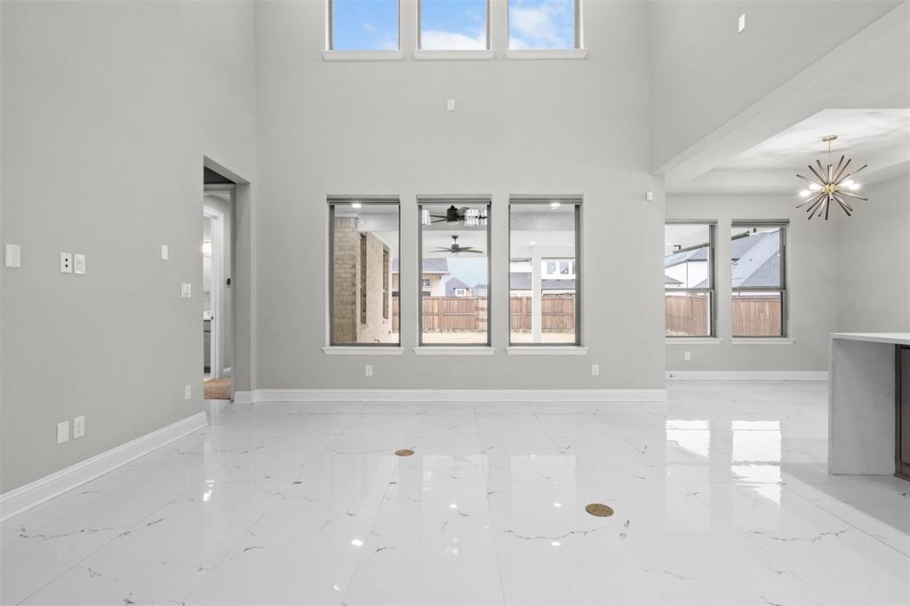 4505 Fall Mdw Drive Prosper, TX 75078 - Photo 6 of 34 a view of an empty room with a window