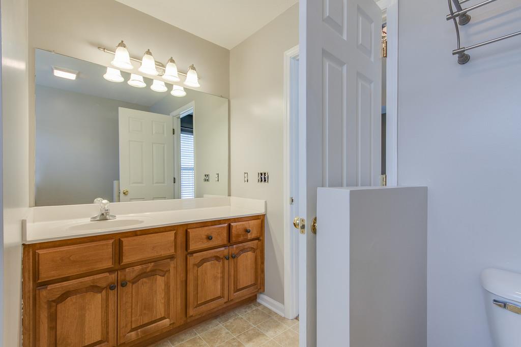 144 Fieldstone Lane Springfield, TN 37172 - Photo 13 of 24 a bathroom with a double vanity sink mirror and double
