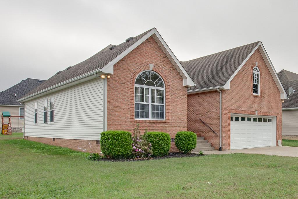 144 Fieldstone Lane Springfield, TN 37172 - Photo 2 of 24 a front view of a house with a yard
