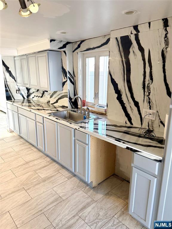 132 Union Street Wood-Ridge, NJ 07075 - Photo 4 of 7 a kitchen with stainless steel appliances granite countertop a sink and cabinets