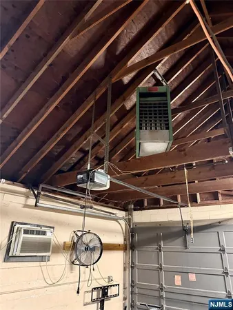 a water heater on the wall in a room