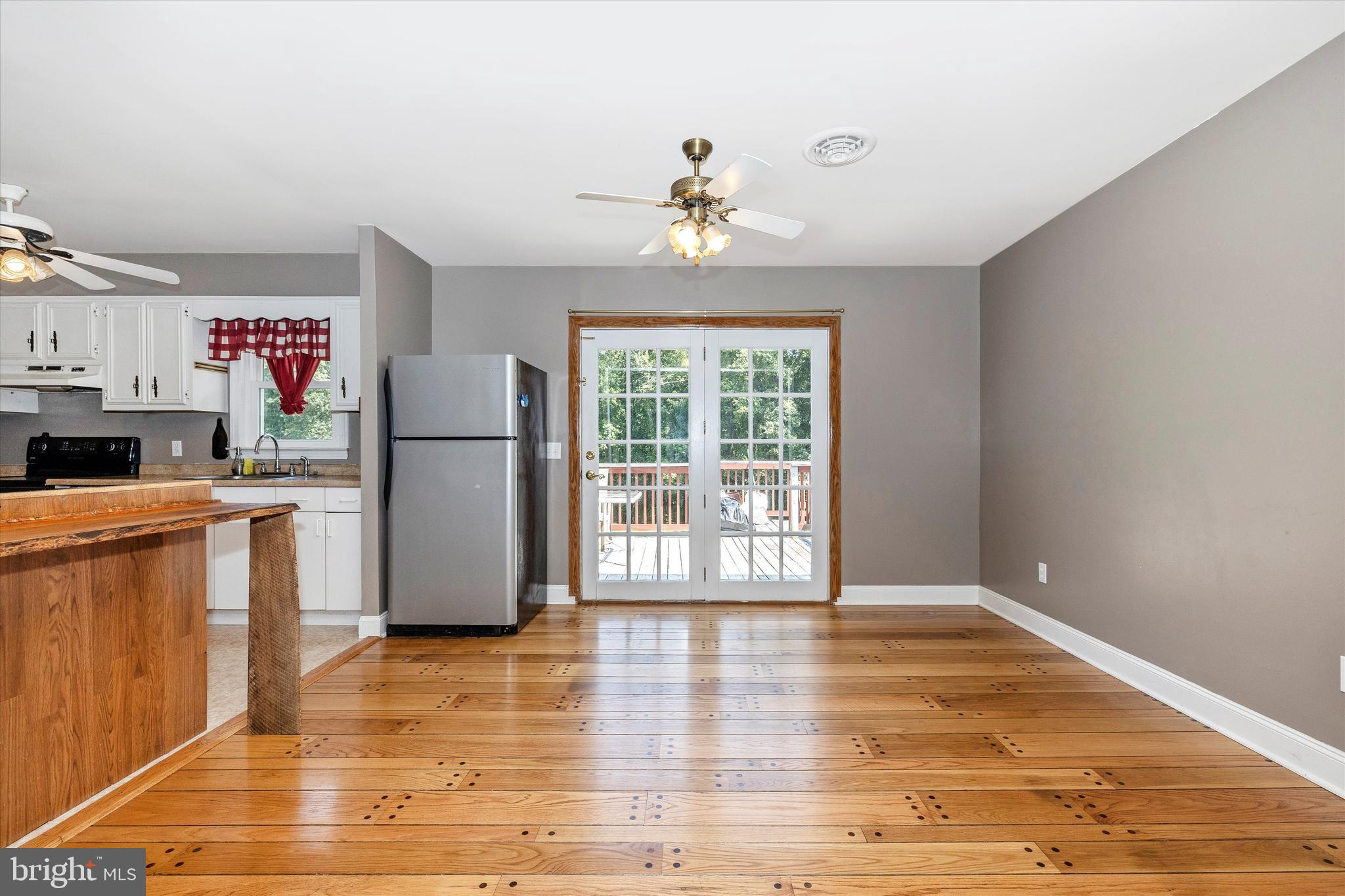 5327 Buffalo Road Mount Airy, MD 21771 - Photo 10 of 54 Dining Area has Atrium Door to Deck & Yard