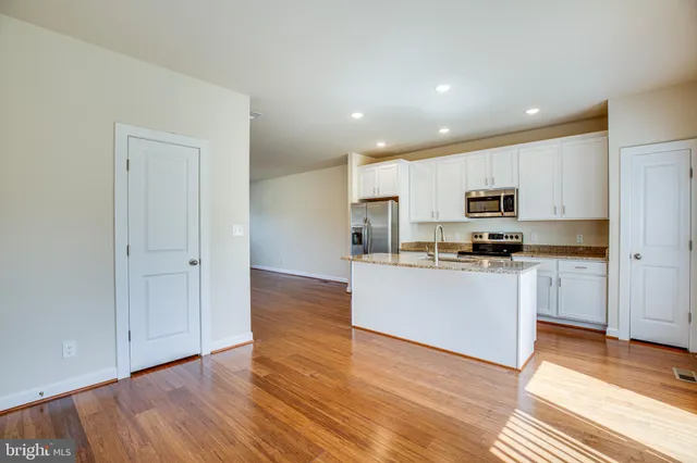 a view of a bathroom with mirror