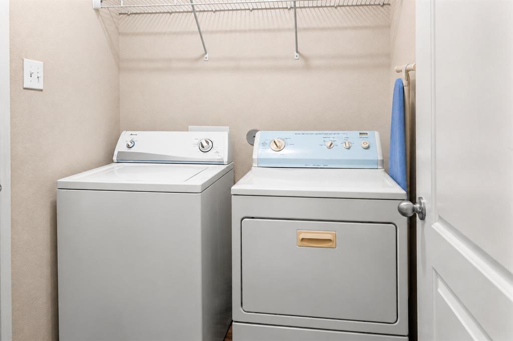 3005 Parker Road Anna, TX 75409 - Photo 14 of 15 Dedicated laundry area featuring a washer and dryer unit, and overhead wire shelving