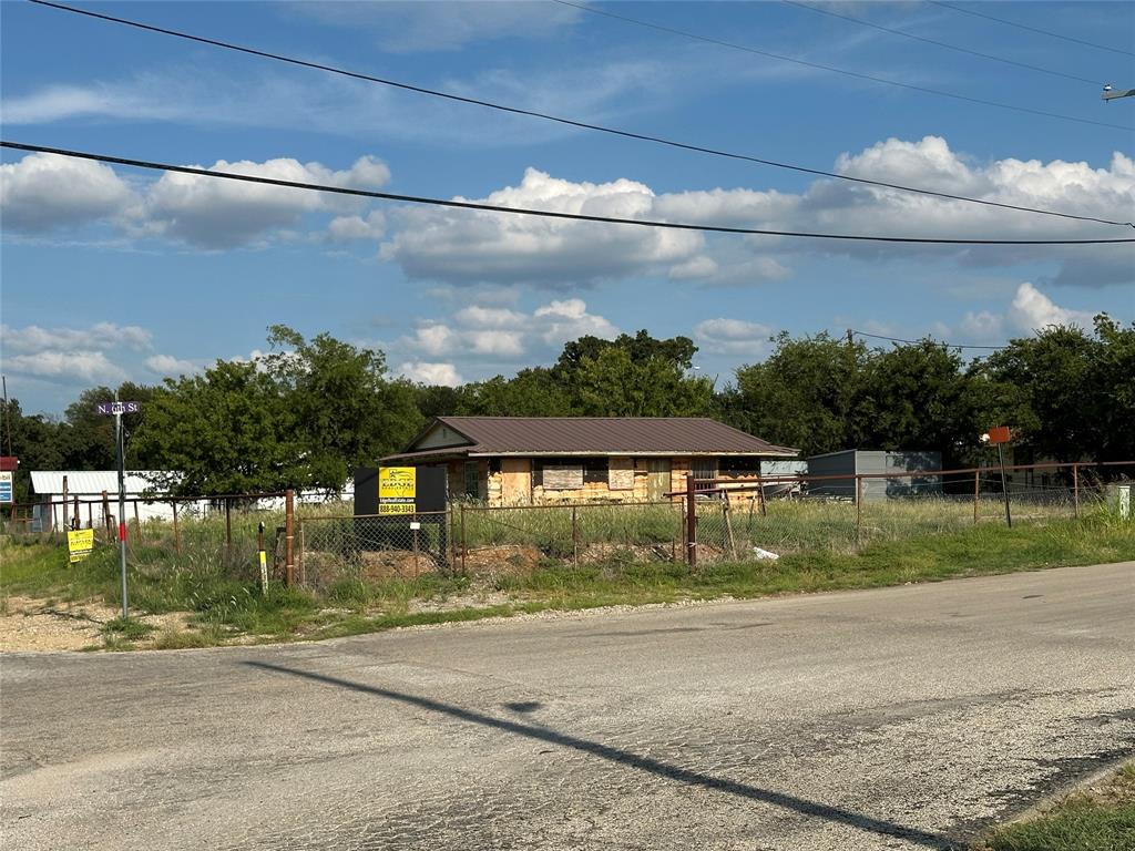 Tbd North Main Street Jacksboro, TX 76458 - Photo 3 of 5 a front view of a house with a yard