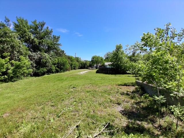 1017 Caron Street Robinson, TX 76706 - Photo 2 of 4 a view of a garden with a tree