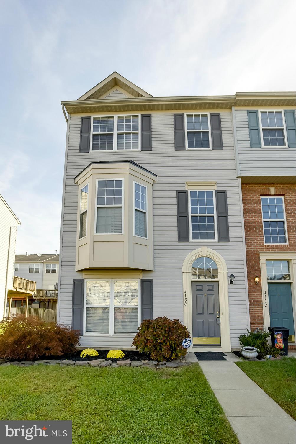 4130 Cutty Sark Road Baltimore, MD 21220 - Photo 1 of 24 a front view of a house with a garden