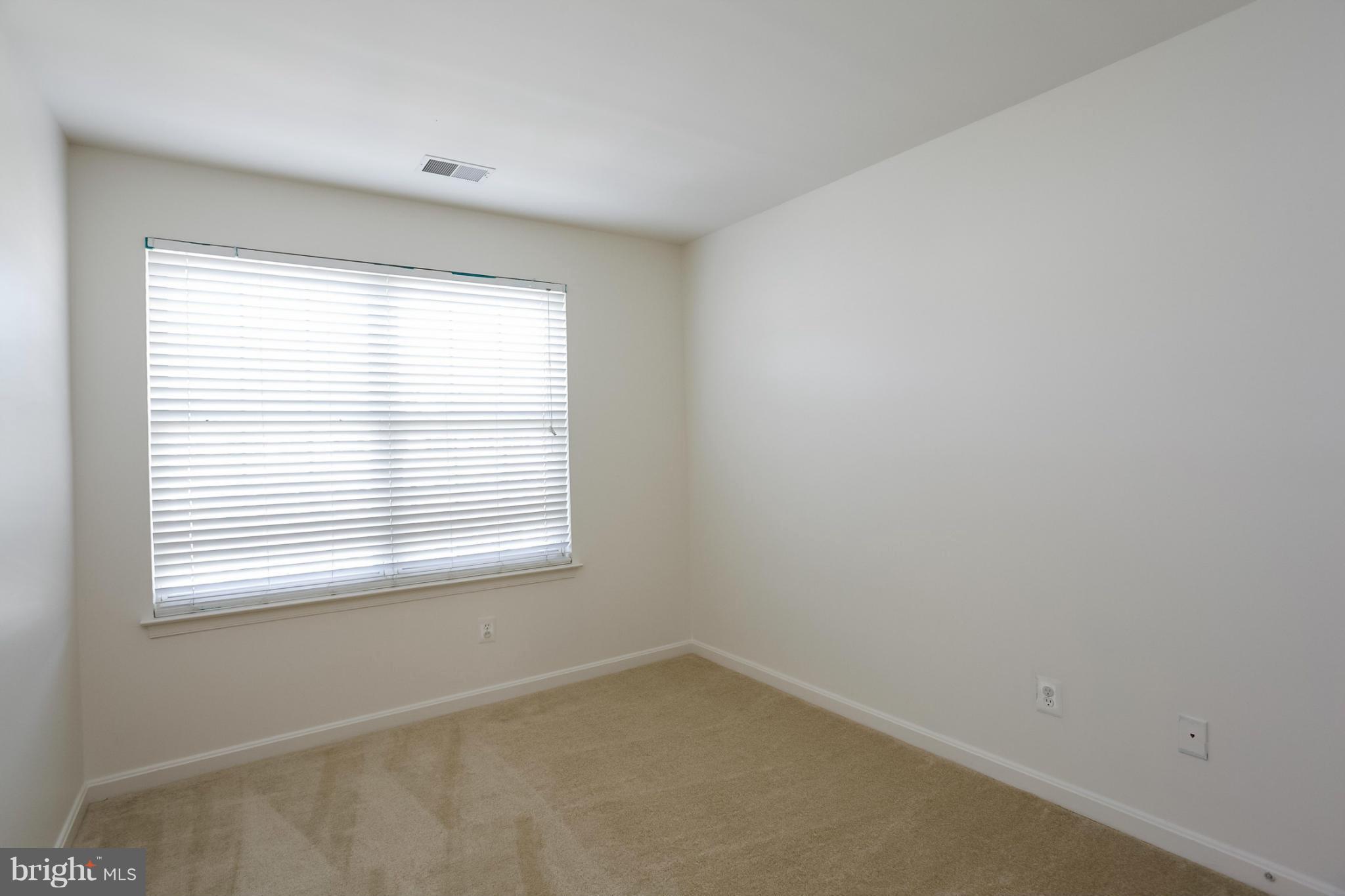 4130 Cutty Sark Road Baltimore, MD 21220 - Photo 15 of 24 a view of an empty room with a window