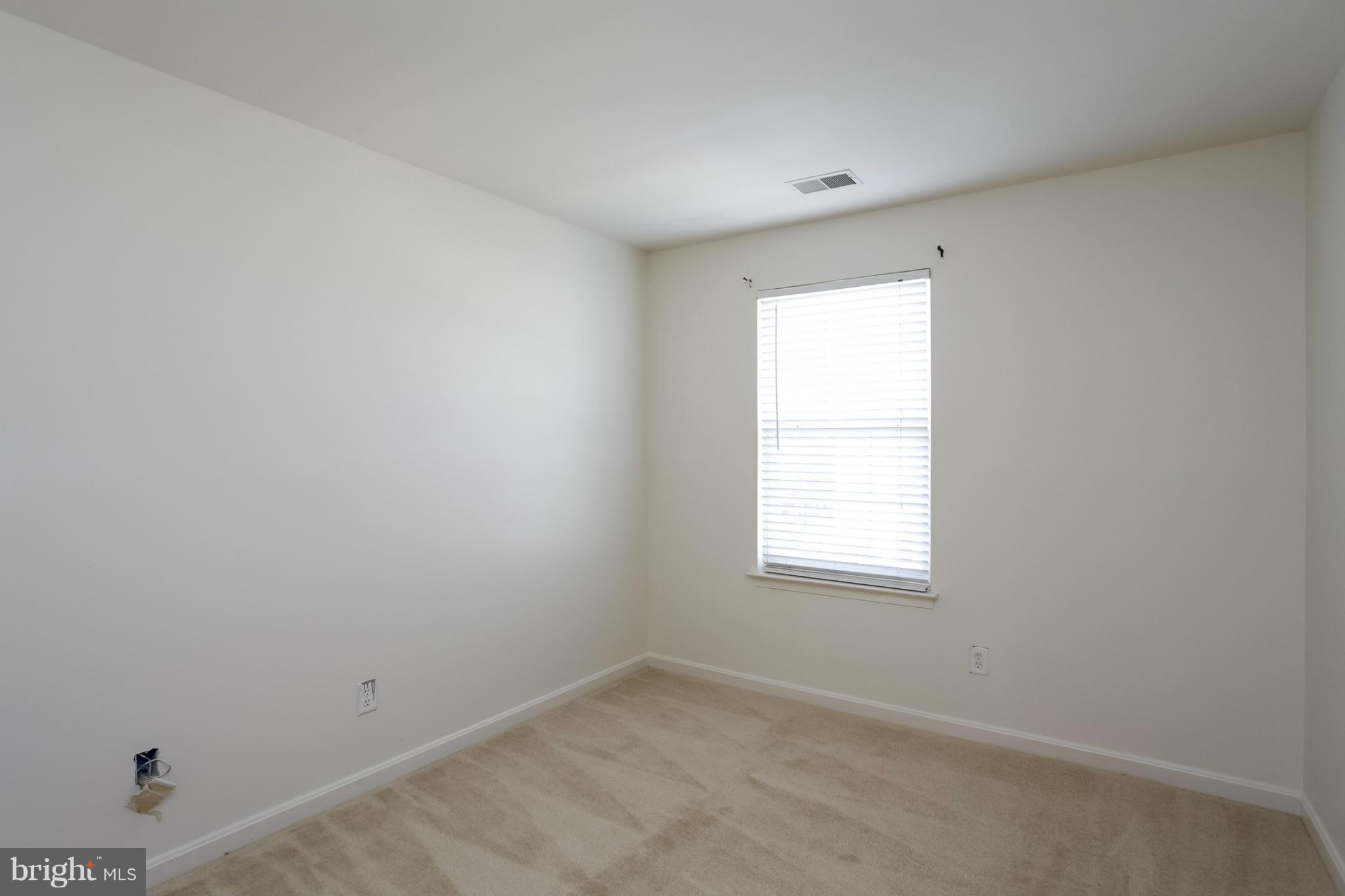 4130 Cutty Sark Road Baltimore, MD 21220 - Photo 18 of 24 an empty room with a window