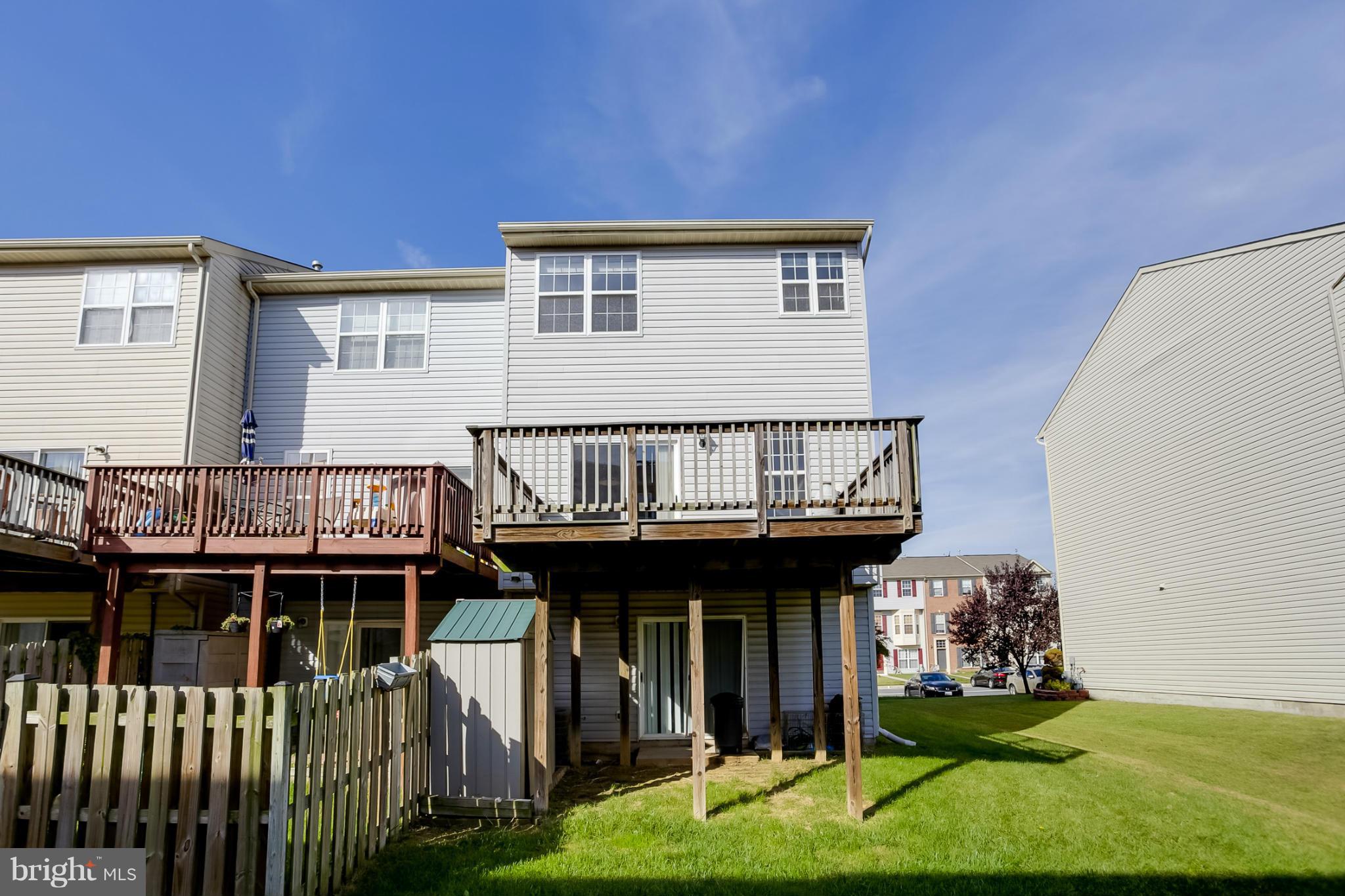 4130 Cutty Sark Road Baltimore, MD 21220 - Photo 24 of 24 a view of a house with backyard porch and wooden fence