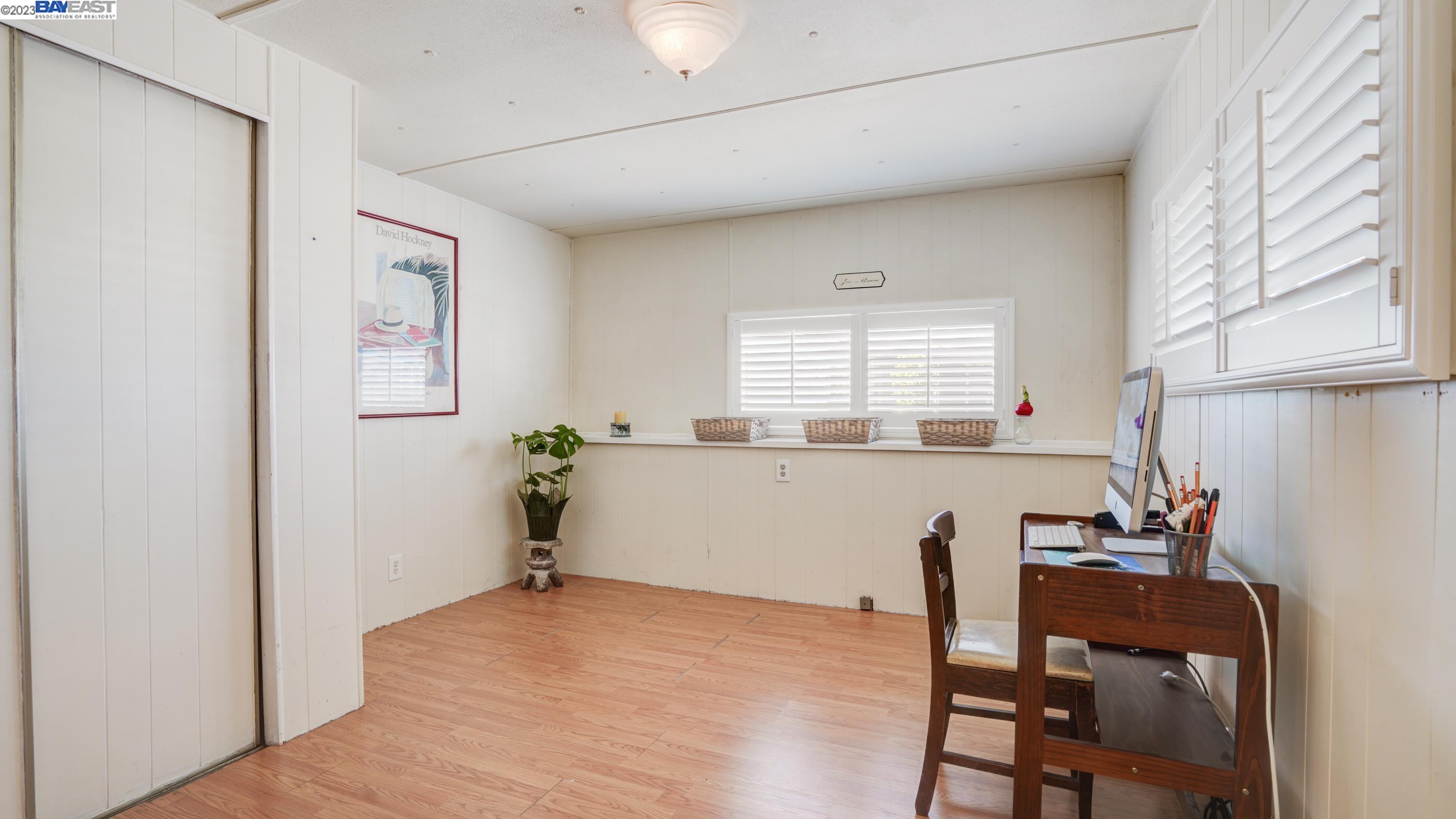 208 Yosemite Road San Rafael, CA 94903 - Photo 1 of 1 a workspace with furniture and window