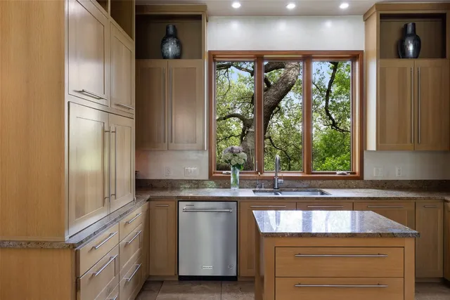 a living room with fireplace furniture and a flat screen tv